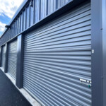 Row of outdoor drive-up storage units