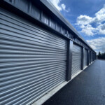 Row of outdoor drive-up storage units