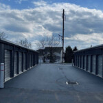 Aisle of outdoor drive-up storage units